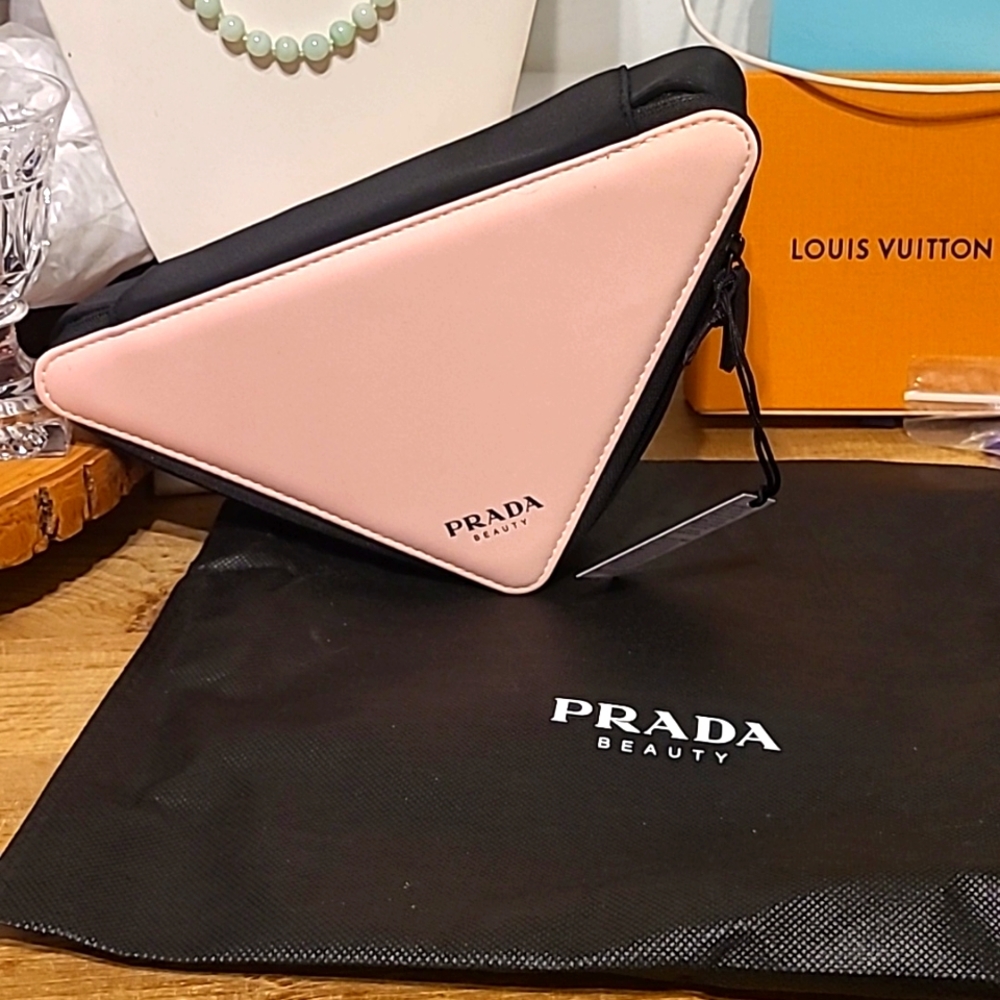 New with tag pink and black Prada Beauty bag triangle shape